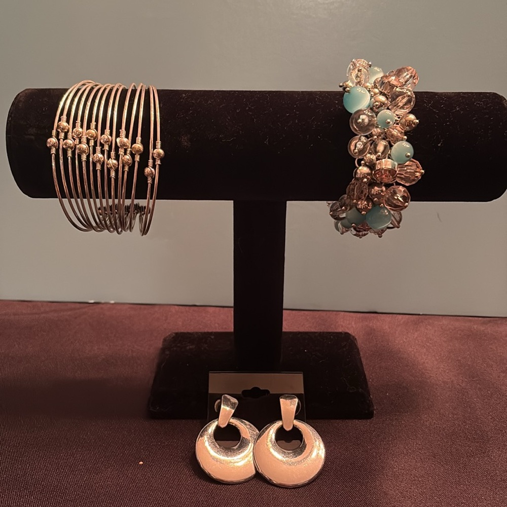 Silver tone earrings and bracelets